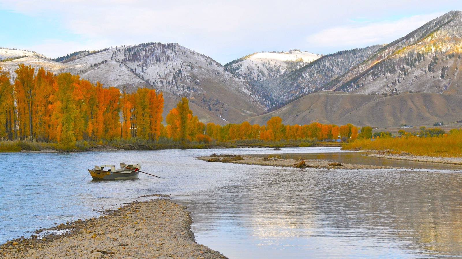 Fishing Jackson Hole snake river fly fishing boat in the fall