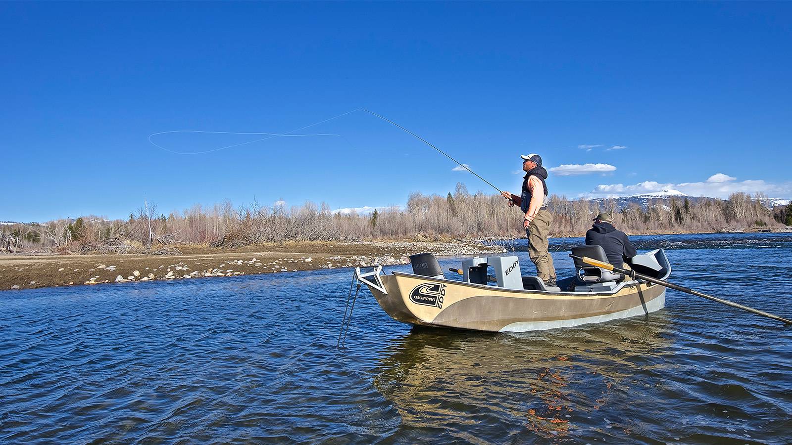 Learn to fly fish guide casting from his boat