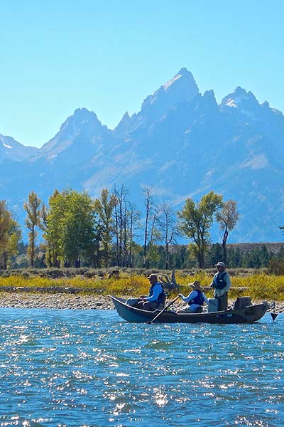 Jackson Hole Fly Fishing guide and client fishing on the snake river