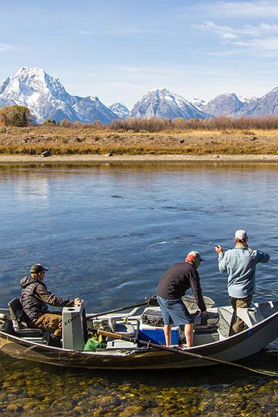 Jackson Hole Wyoming Fly Fishing Report Guides and Clients taking a break on snake river float