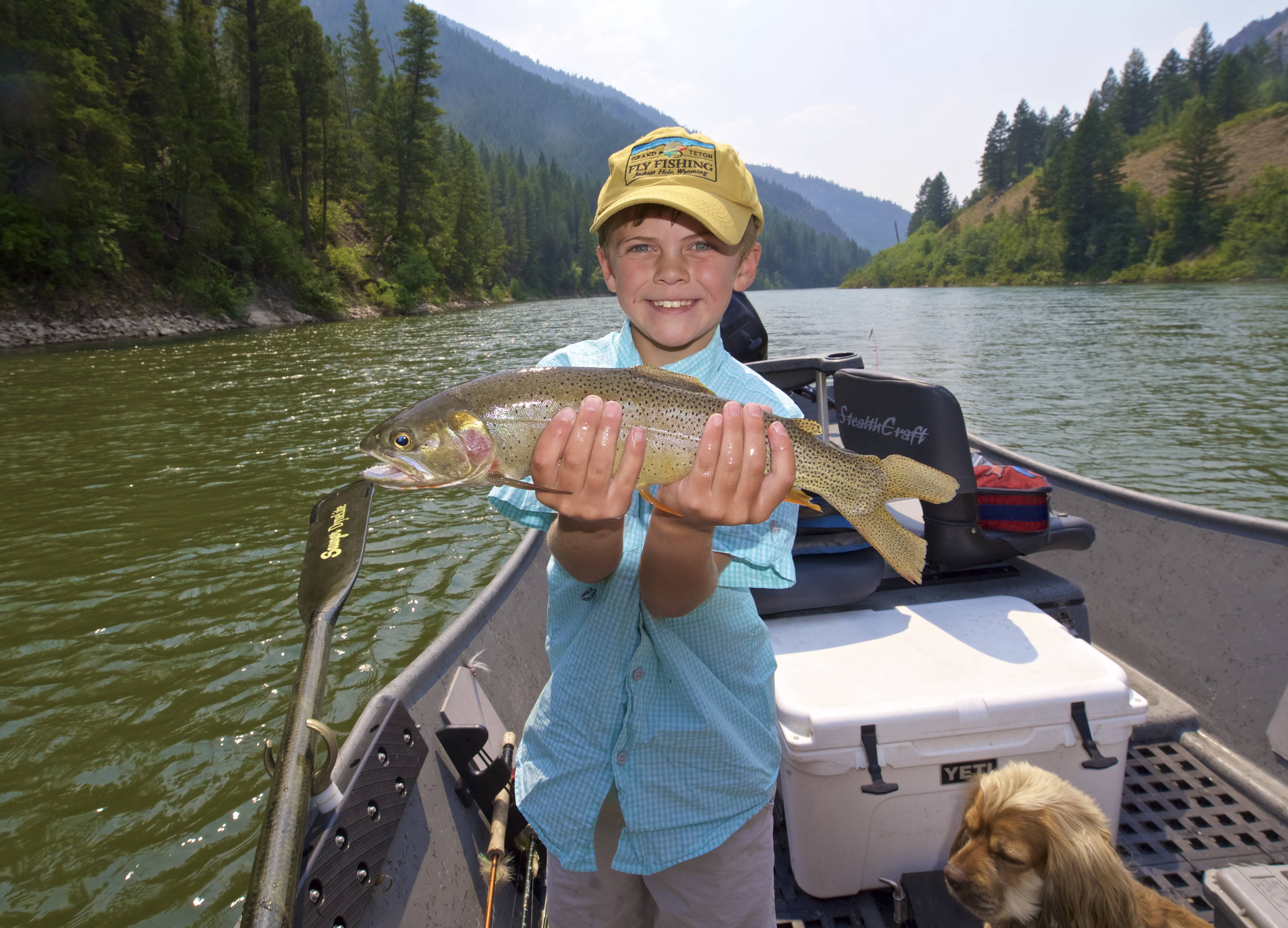 Snake River boy with a huge trout