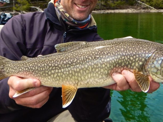 yellowstone lake fishing guides happy client with trout